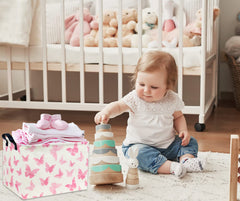 TIBAOLOVER rectangular butterfly basket in use as toy storage.