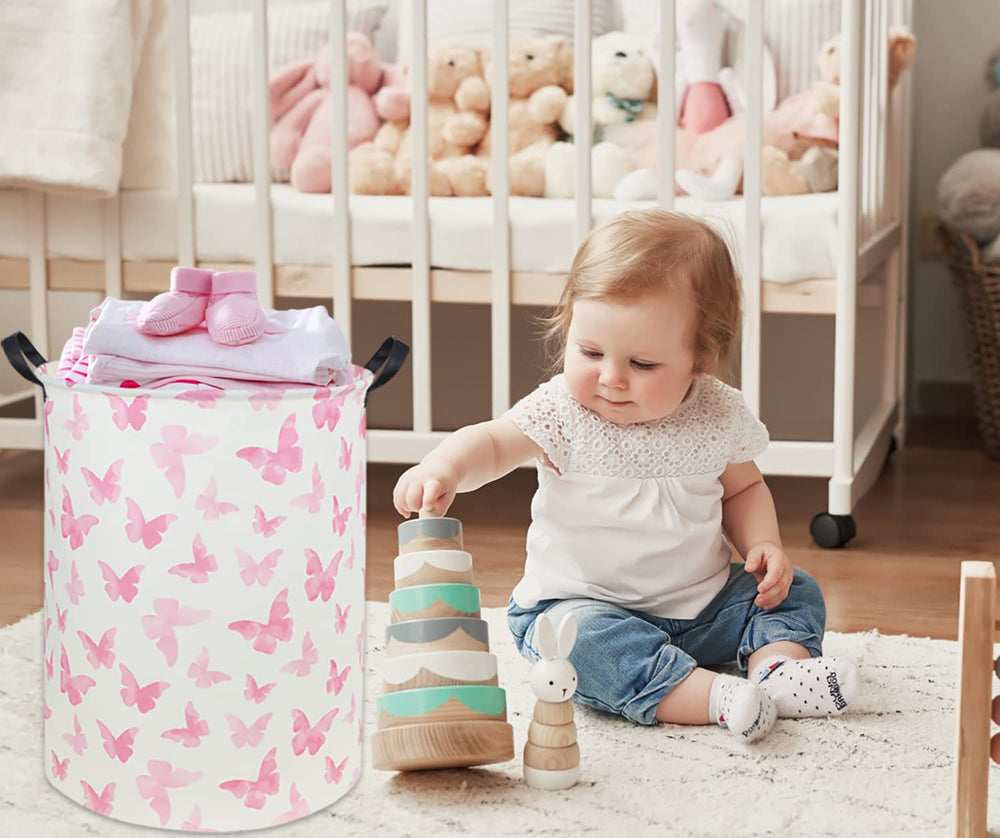 TIBAOLOVER butterfly pink laundry hamper with waterproof inner lining protects fabrics.