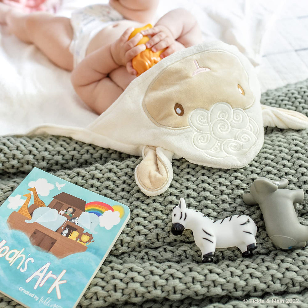 Tickle & Main ark-themed gift-table display suggests registry-ready presentation.