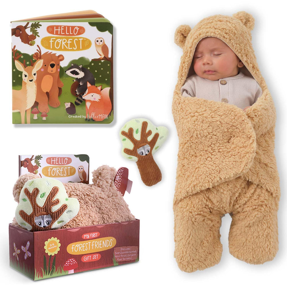 Tickle & Main forest animal swaddle in soft cotton provides cozy newborn comfort.