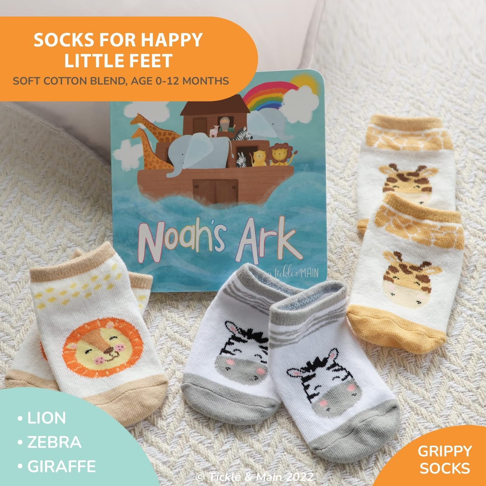 Tickle & Main Noah’s Ark lion socks design adds cozy infant warmth.