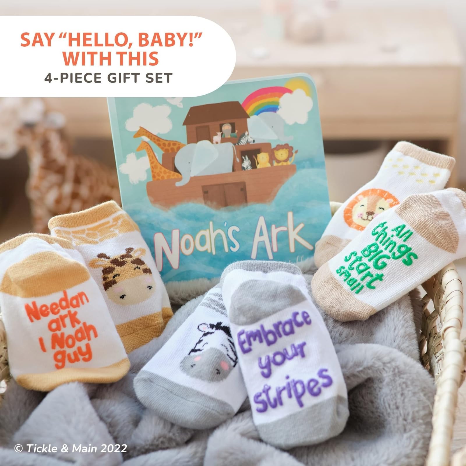Tickle & Main Noah’s Ark socks trio with animal faces for newborn comfort.