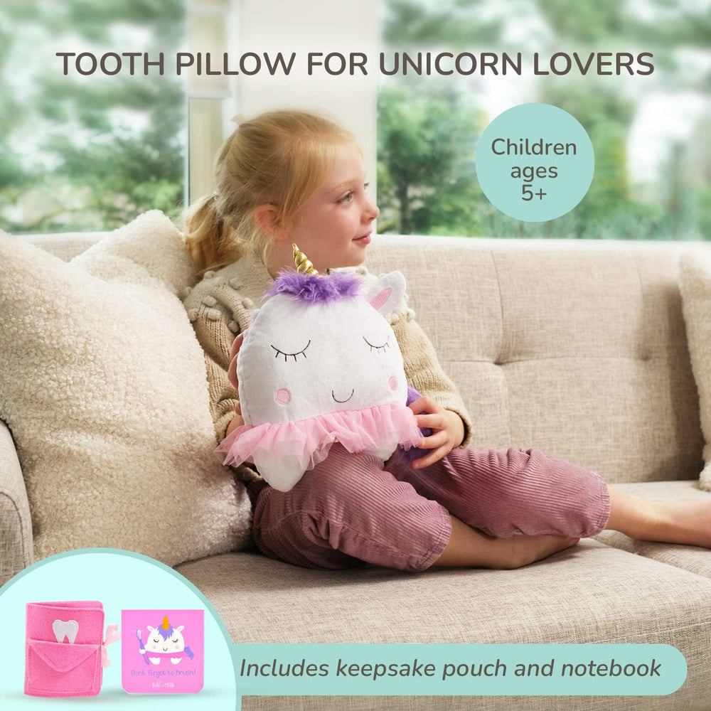 Tickle and Main unicorn tooth holder pocket closeup shows secure tooth storage.