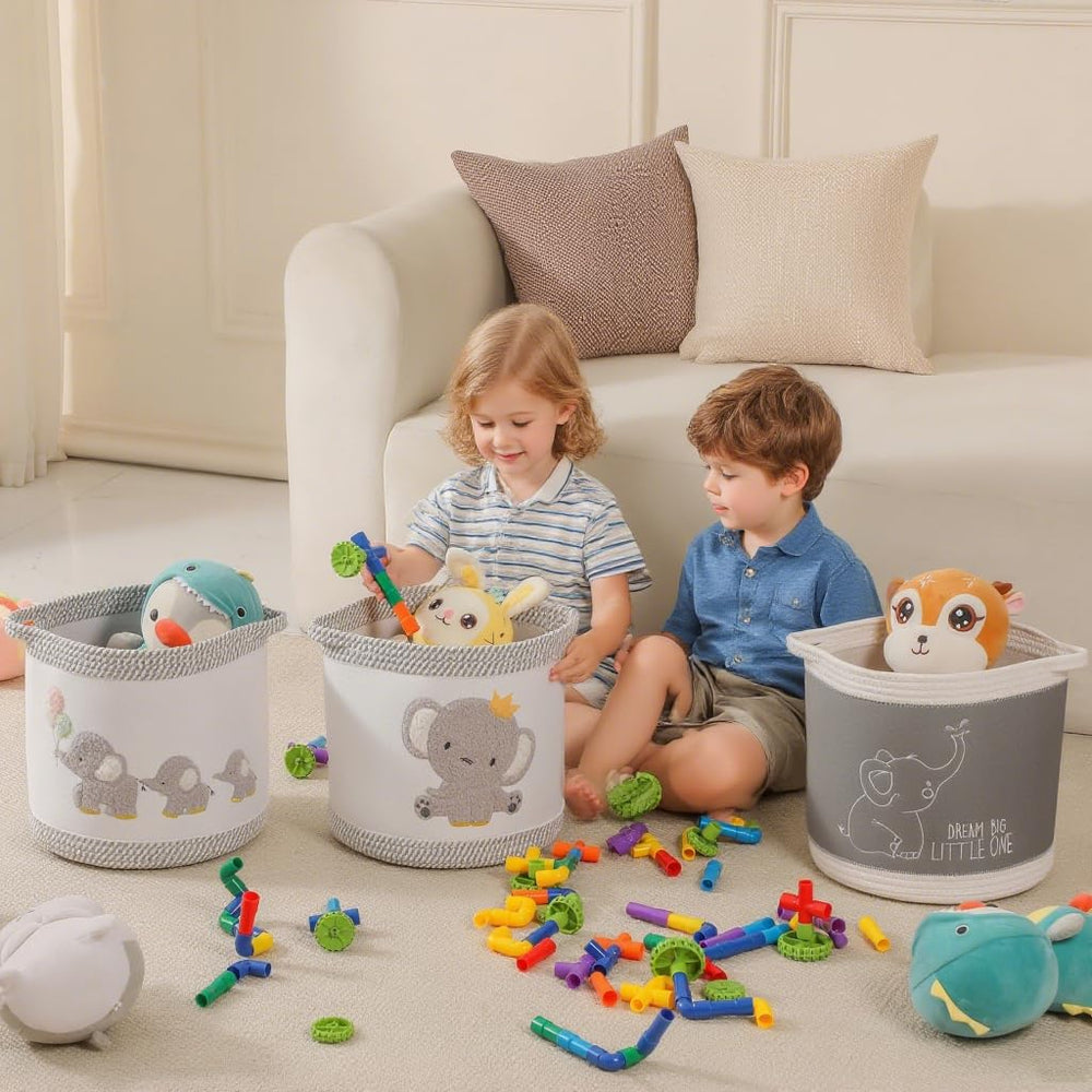 Tidelit elephant-design nursery set flatlay shows coordinated organization for playroom storage