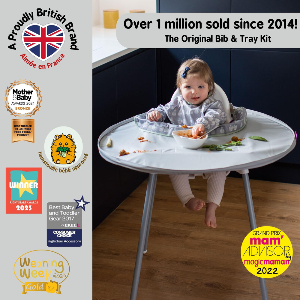 Tidy Tot Bib & Tray Kit tray attached to highchair demonstrates stable feeding surface