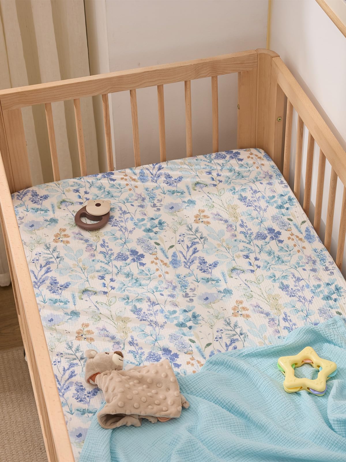TILLYOU 2-pack muslin sheets with natural dyes offer hypoallergenic, gentle sleep options.
