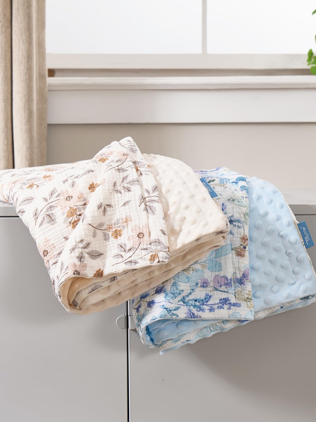 TILLYOU baby blanket in a cozy nursery setup demonstrating versatile daily uses