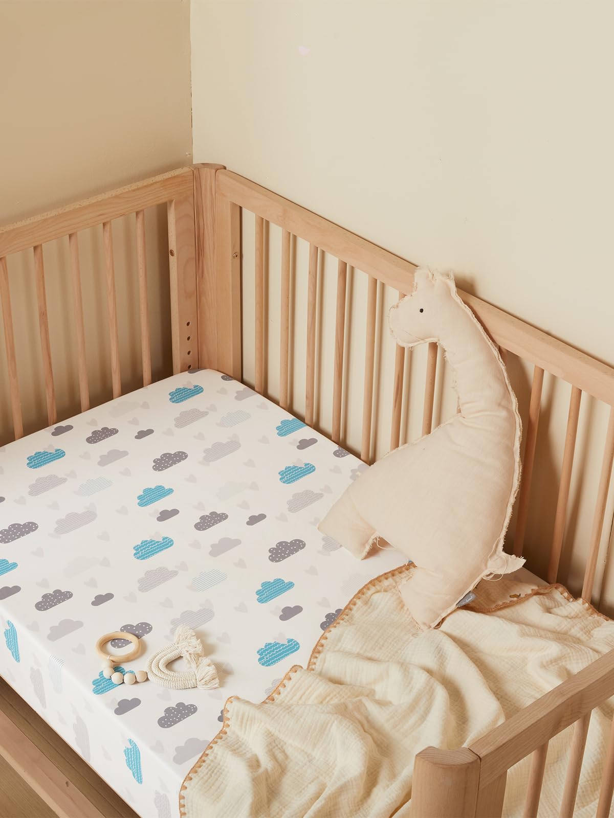 TILLYOU crib sheets closeup shows soft, breathable fabric for baby comfort.