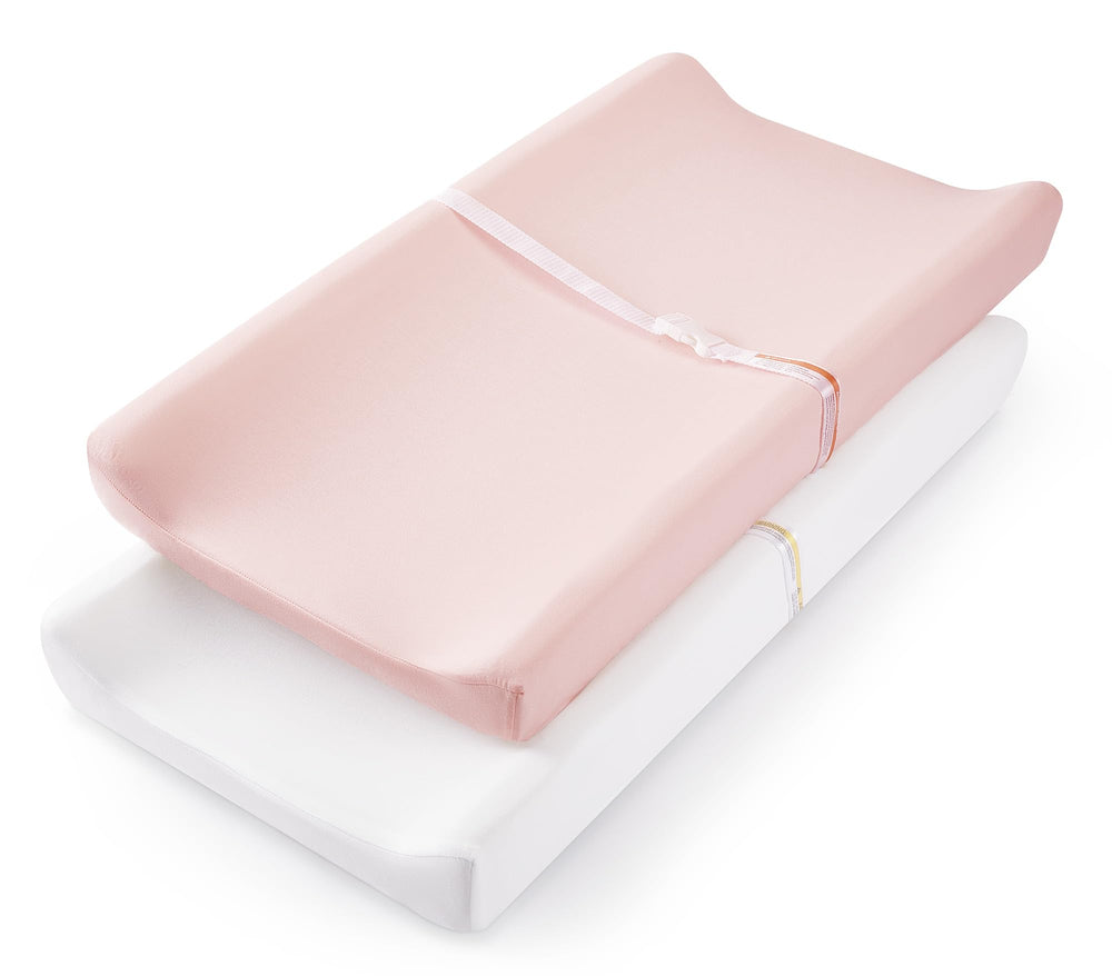 TILLYOU changing pad cover Peachy Pink side view demonstrates secure fit for everyday diaper changes.