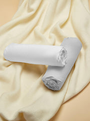 TILLYOU crib sheet shows looped elastic bottom for quick changes.