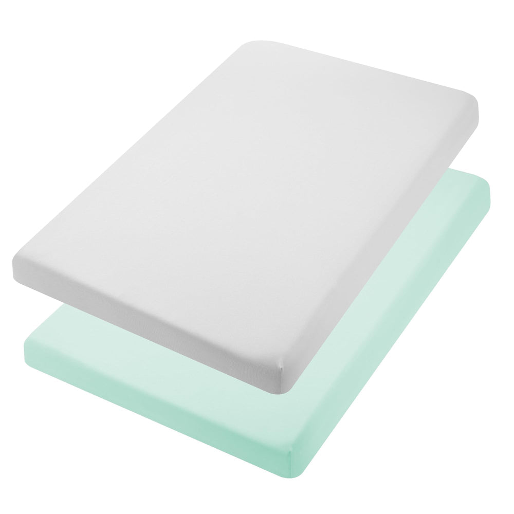 TILLYOU mini crib sheet on a playpen mattress with soft colors in a nursery.