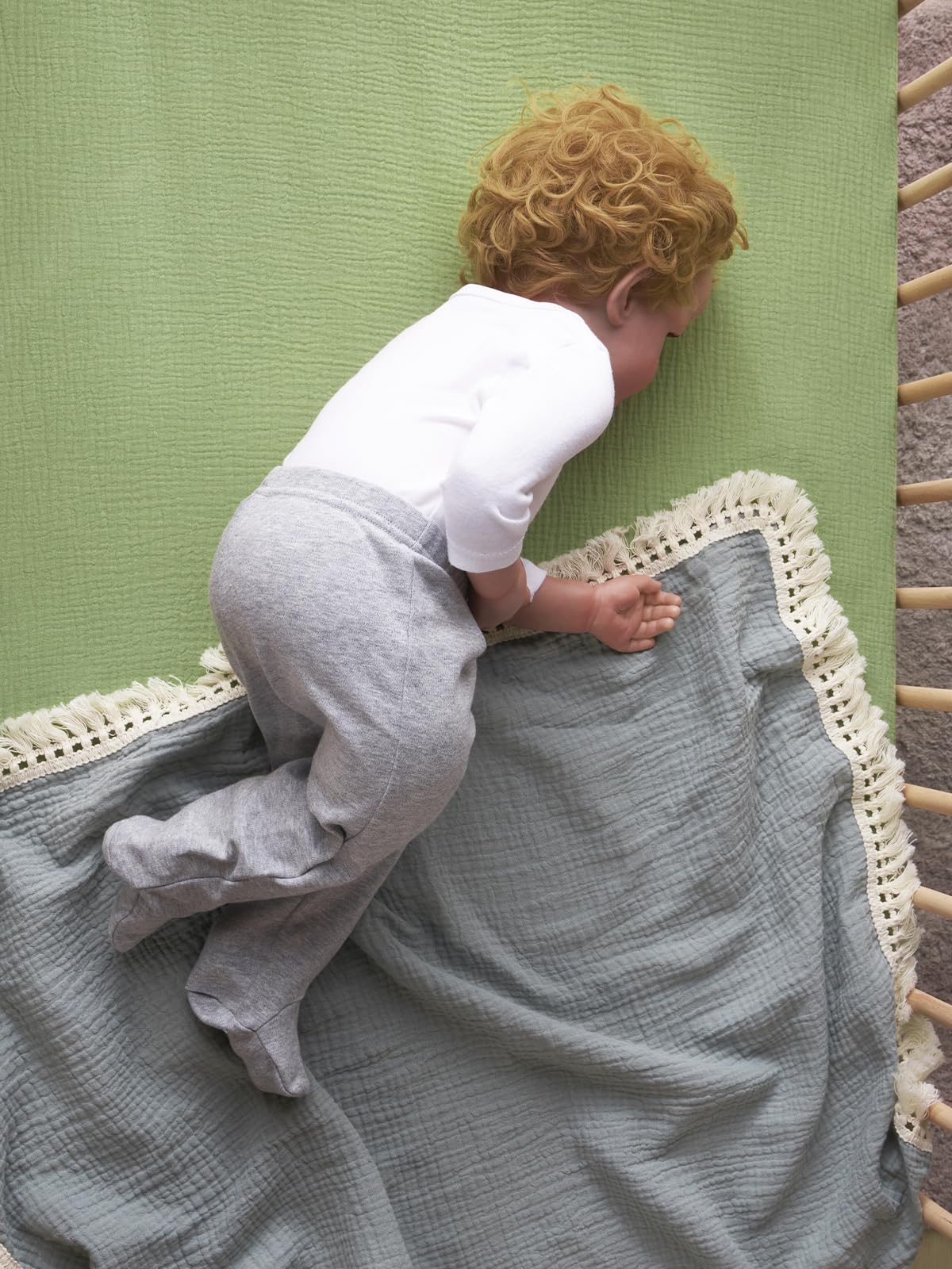TILLYOU muslin fabric closeup reveals breathable weave and gentle touch.
