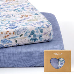TILLYOU Muslin mini crib sheet blue flower folded showing soft texture for sensitive baby skin