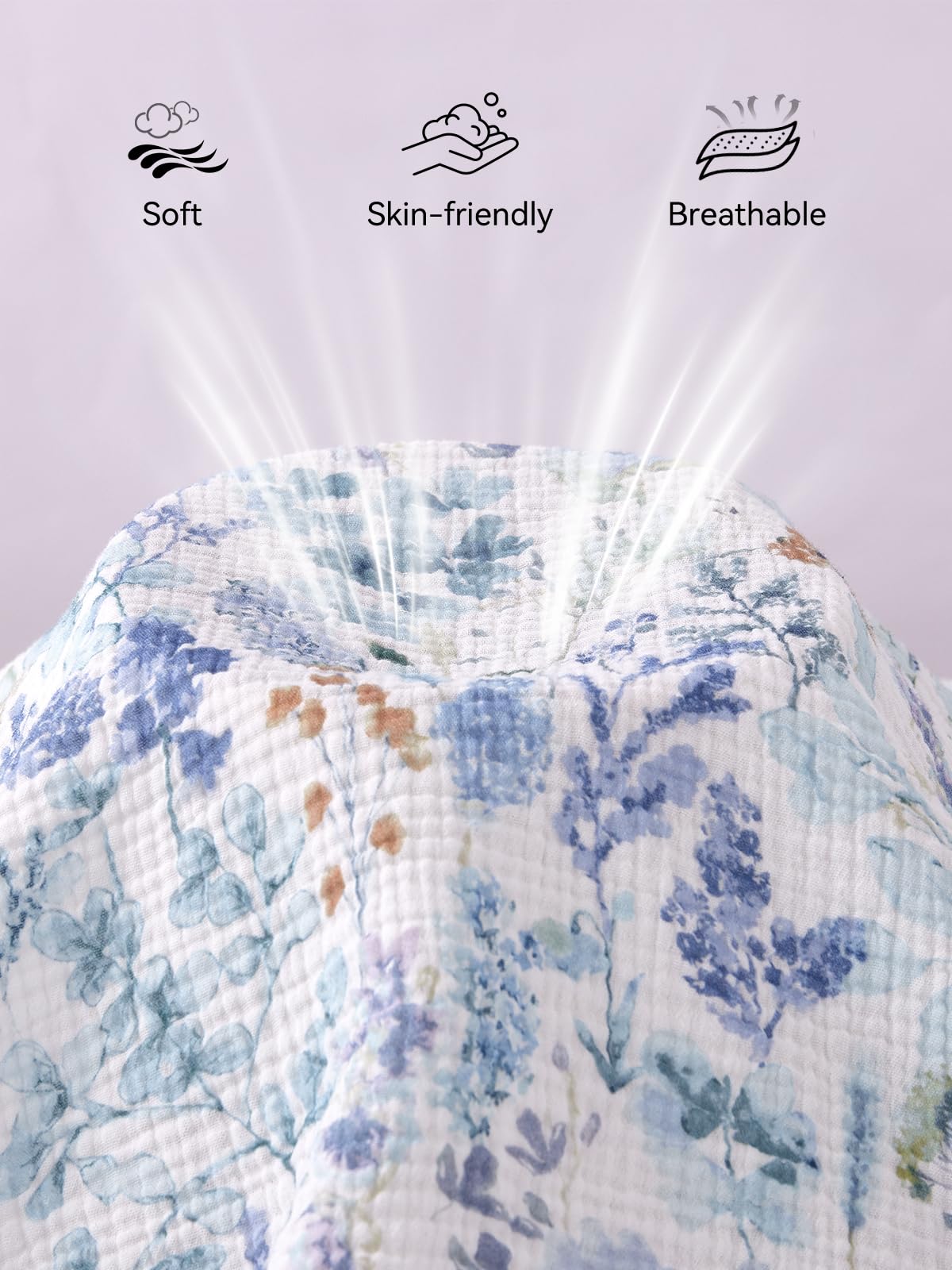 TILLYOU Muslin mini crib sheet elastic edge closeup shows secure, wrinkle-free edge