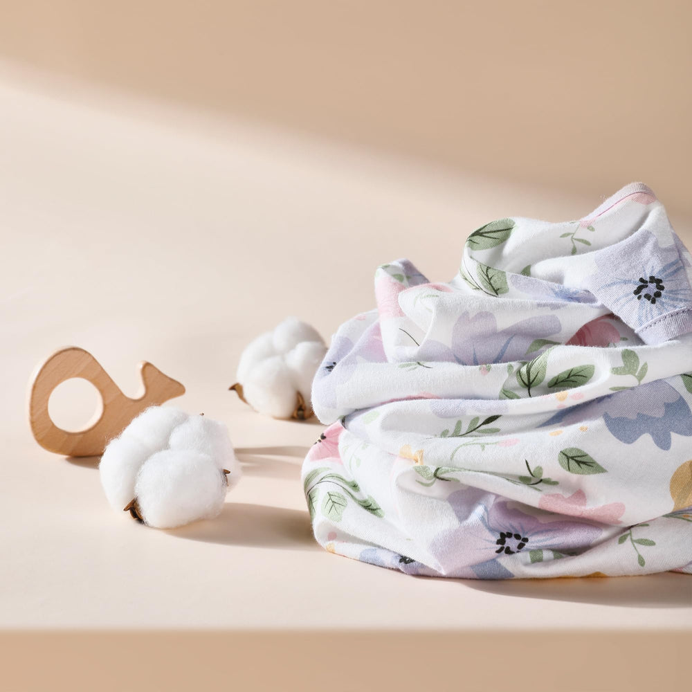 TILLYOU sleeveless sleep sack in purple flowers enhances summer night comfort.