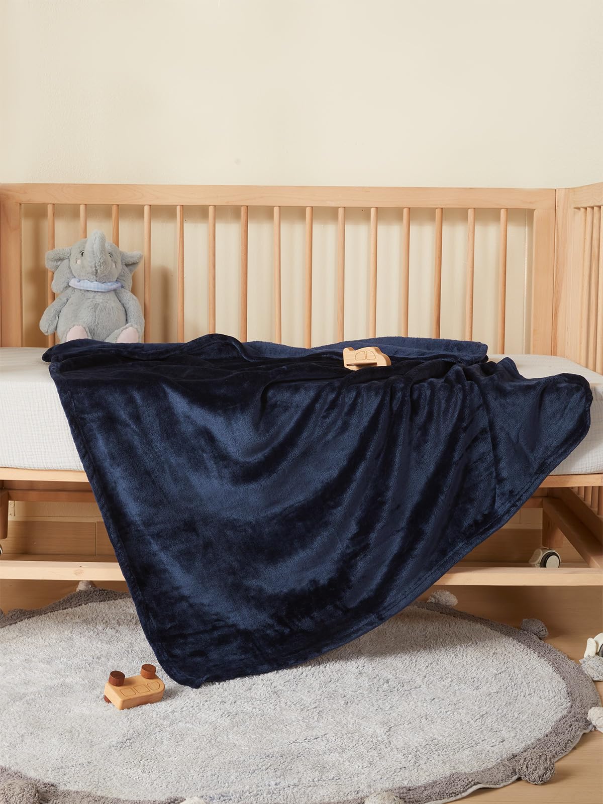 TILLYOU toddler blanket navy color adds cheerful, versatile styling.