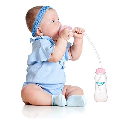 Tinukim iFeed pink tube assembly close-up showing anti-colic venting in action.