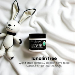 Tiny Human Supply Co nipple balm applied on skin for soothing comfort
