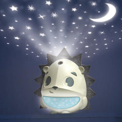 Tiny Love Meadow Days nightlight glows softly for quiet time checks.