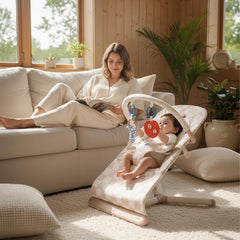 Tiny Marvels baby bouncer side view highlights portable, lightweight design for effortless on-the-go use.