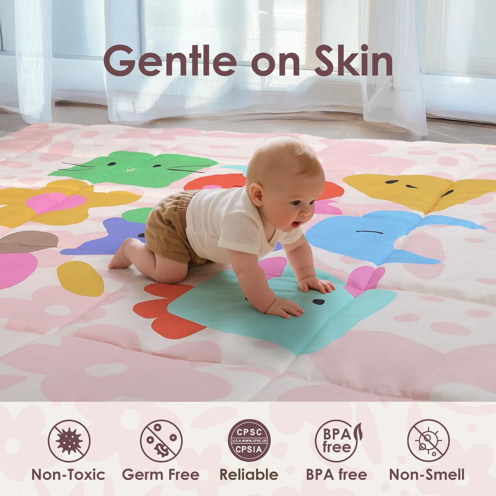 Tiny Marvels 50x50 space shown in-use inside a baby playpen.