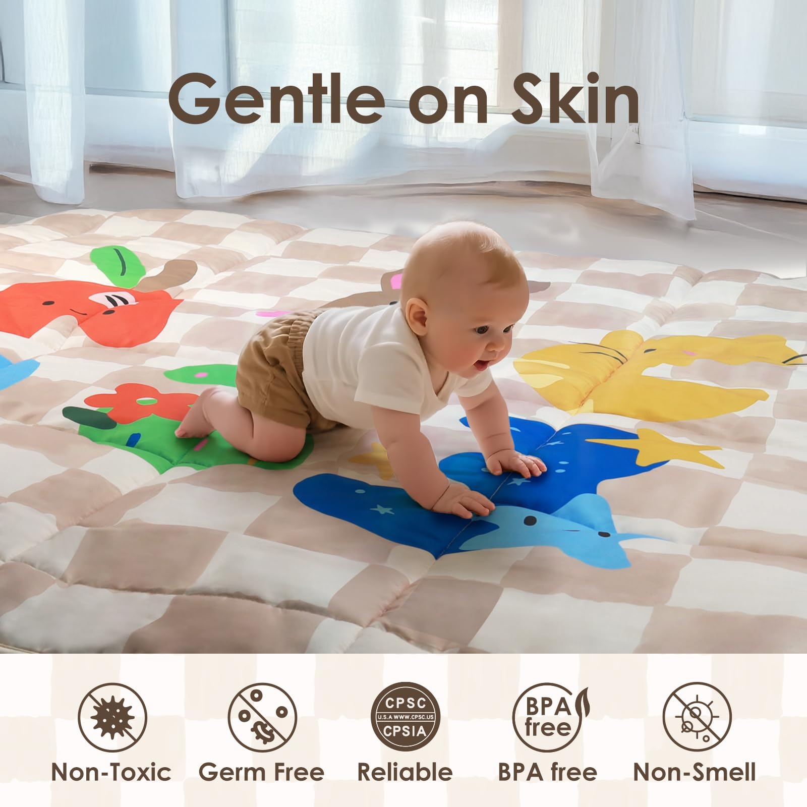 Tiny Marvels baby play mat features letters and numbers for early learning prompts.