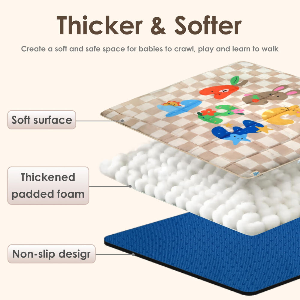 Tiny Marvels baby play mat machine-washable for quick cleanup.