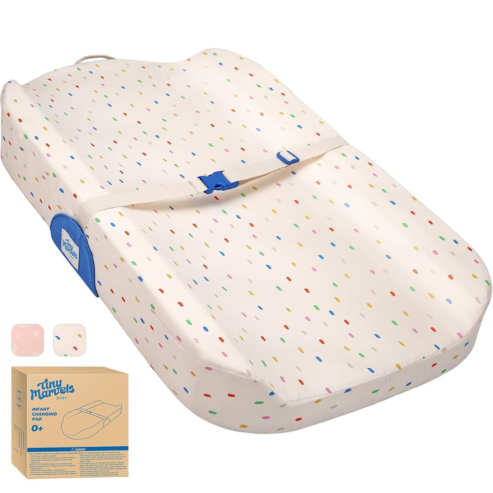 Tiny Marvels changing pad setup on a table for stable, easy diaper changes