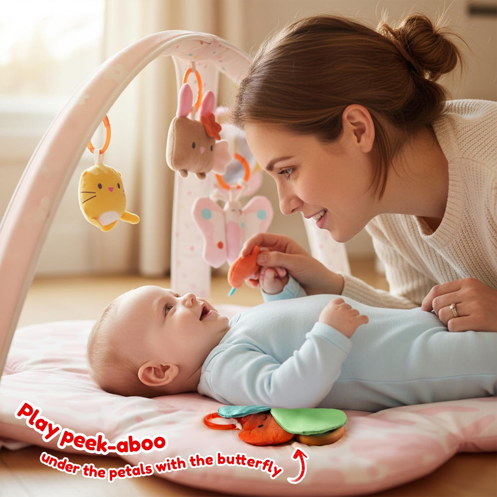Tiny Marvels wood teether leaf offering safe teething texture on the mat