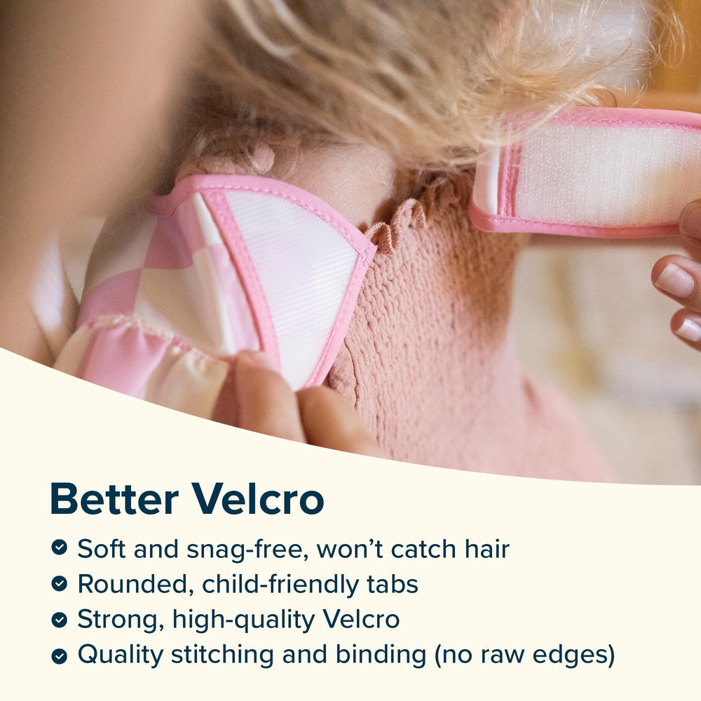 Tiny Twinkle adjustable closure bib ensuring comfy growing-toddler fit.