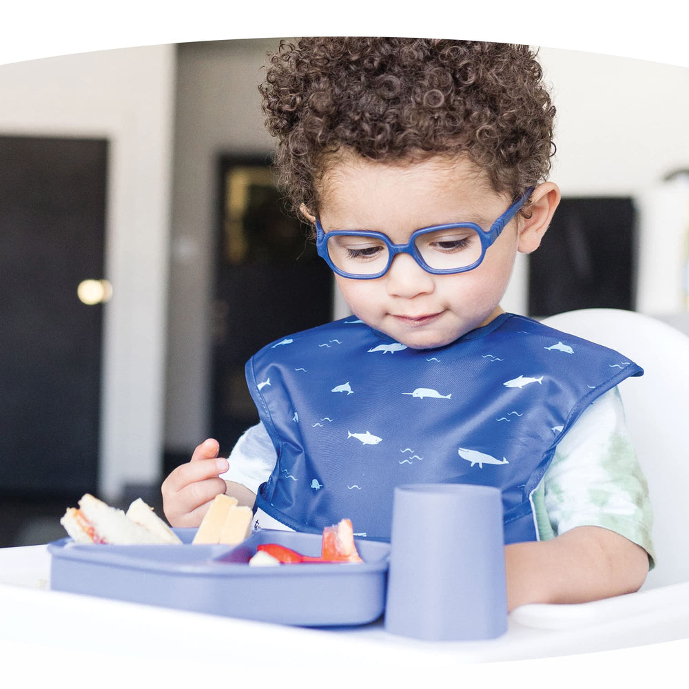 Tiny Twinkle baby-led weaning plate on tray demonstrates self-feeding.