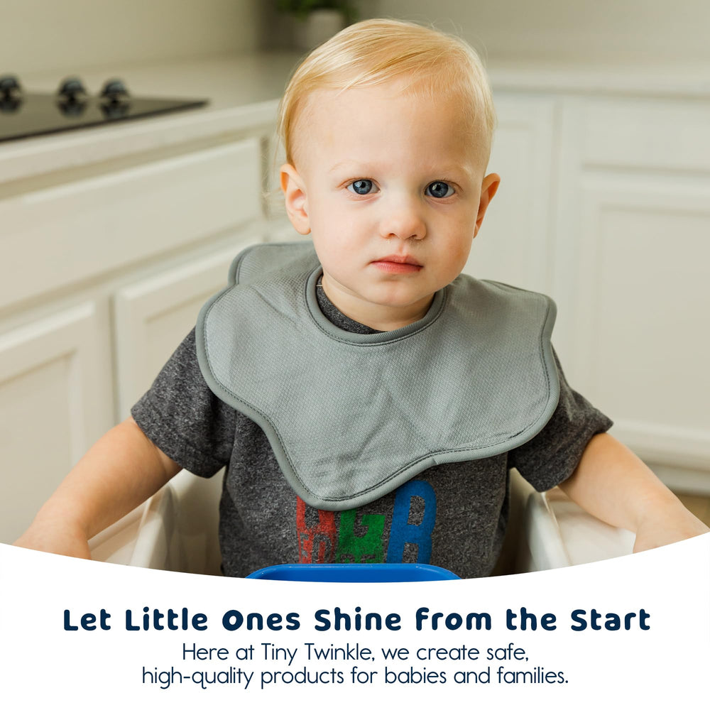 Tiny Twinkle Sage bibs styled for baby outfits to enhance everyday looks.