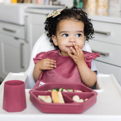 Tiny Twinkle bib with easy-on closure ensures comfy, fuss-free feeding.