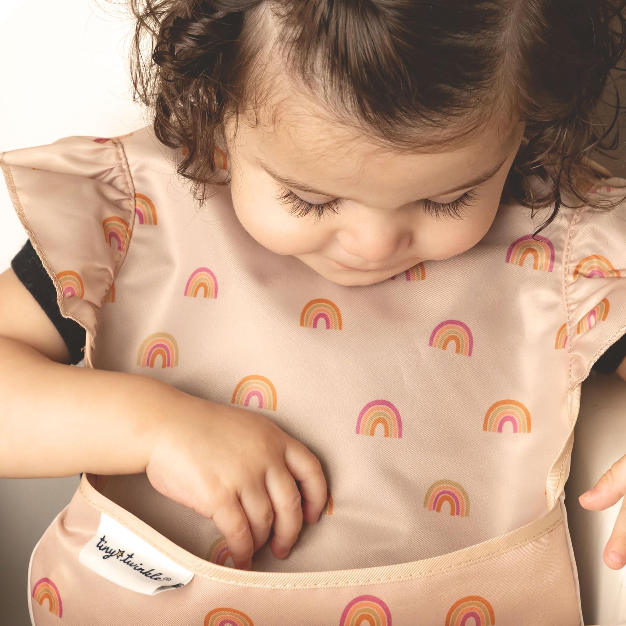 Tiny Twinkle machine-washable bib ready for hassle-free cleaning.
