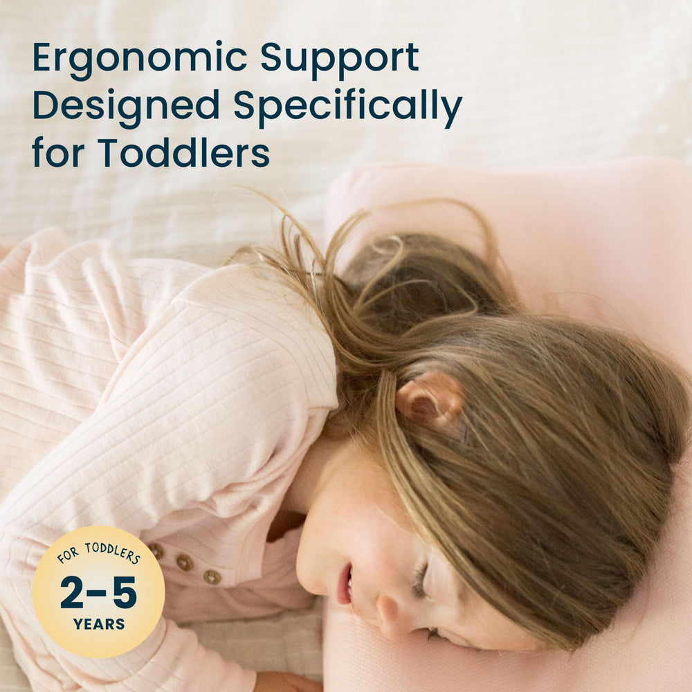 Tiny Twinkle Rainbow pillow cover adds cheerful color to bedtime routine.