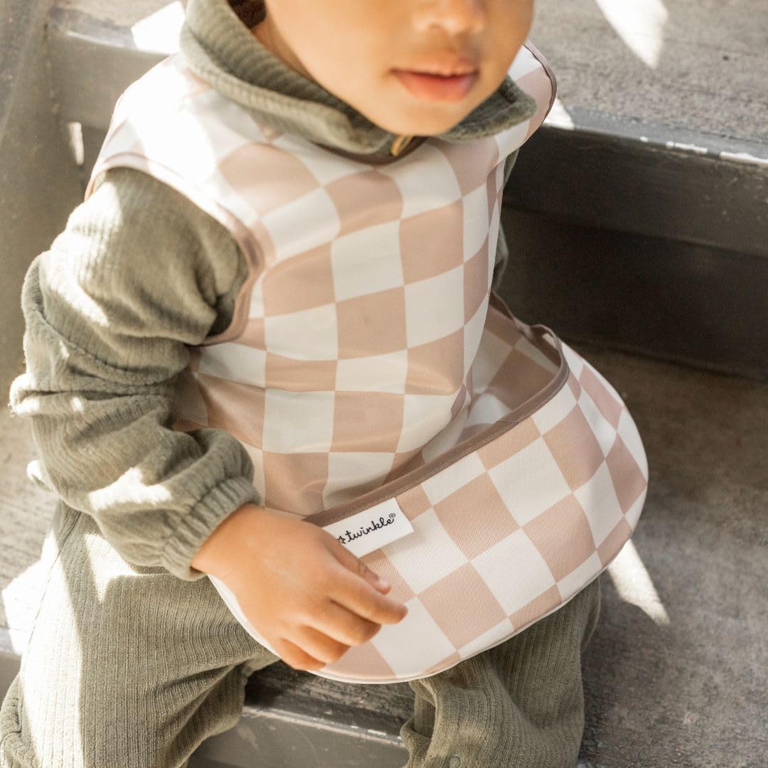 Tiny Twinkle mess-proof bib in action at mealtime with spills and kids.