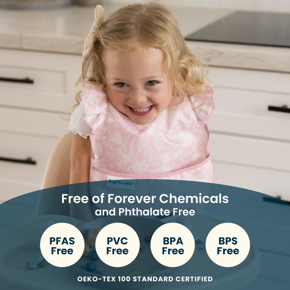 Tiny Twinkle clean dining table protection bib during meals.