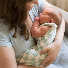 Tiny Twinkle cotton-elastane stretch demonstrates comfy growing-baby fit.