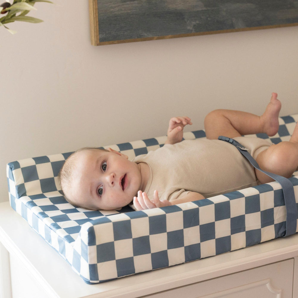 Tiny Twinkle changing pad meets safety standards for baby use.