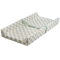 Tiny Twinkle diaper changing pad with sage checkers cover for mess-proof diaper changes.