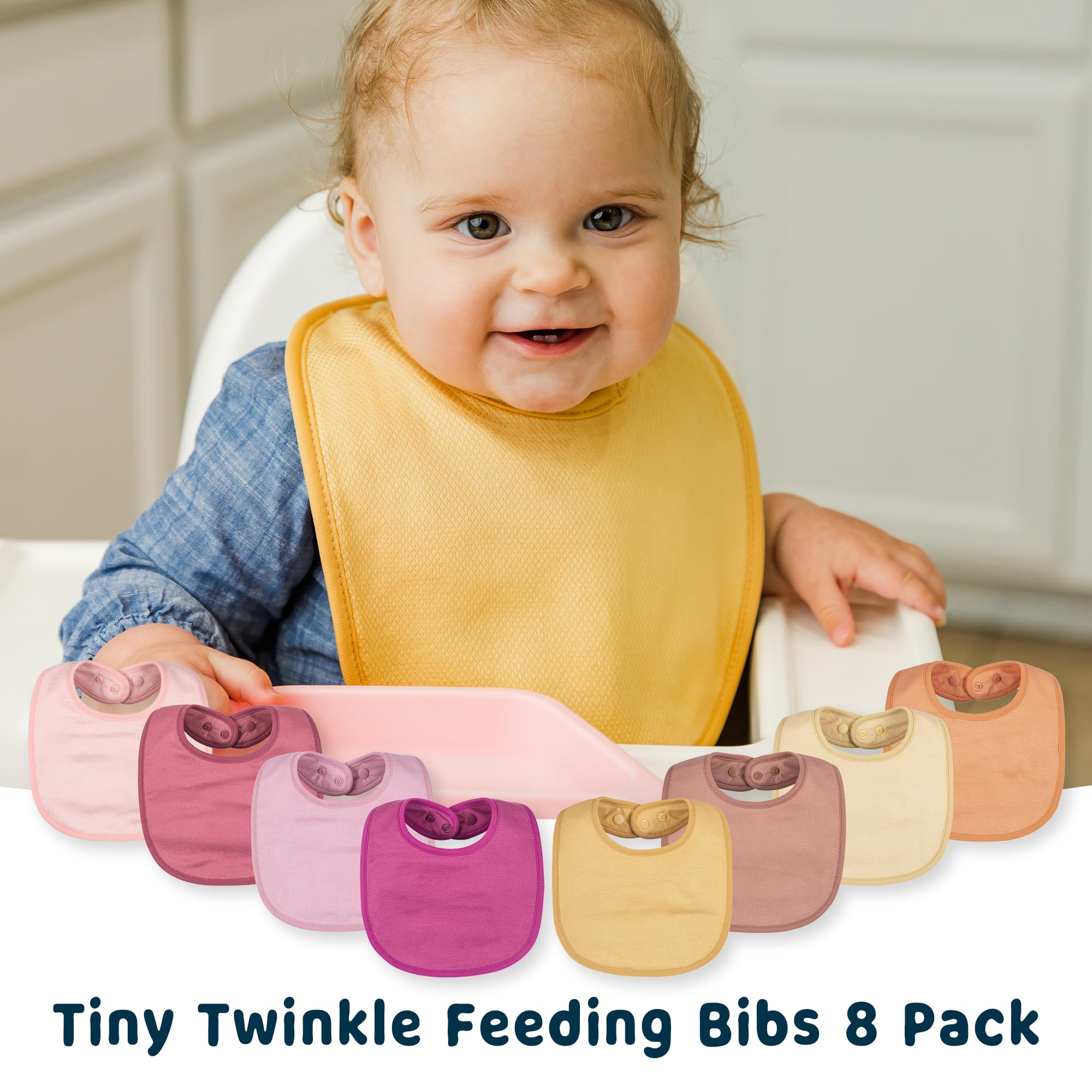 Tiny Twinkle drool-teething bib in use catching drips.