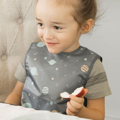 Tiny Twinkle fast-drying fabric keeps bib ready for next bite after quick rinse.