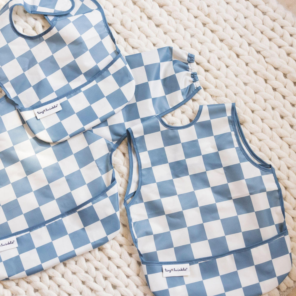 Tiny Twinkle fast-drying fabric bib for easy cleanup after messy bites.