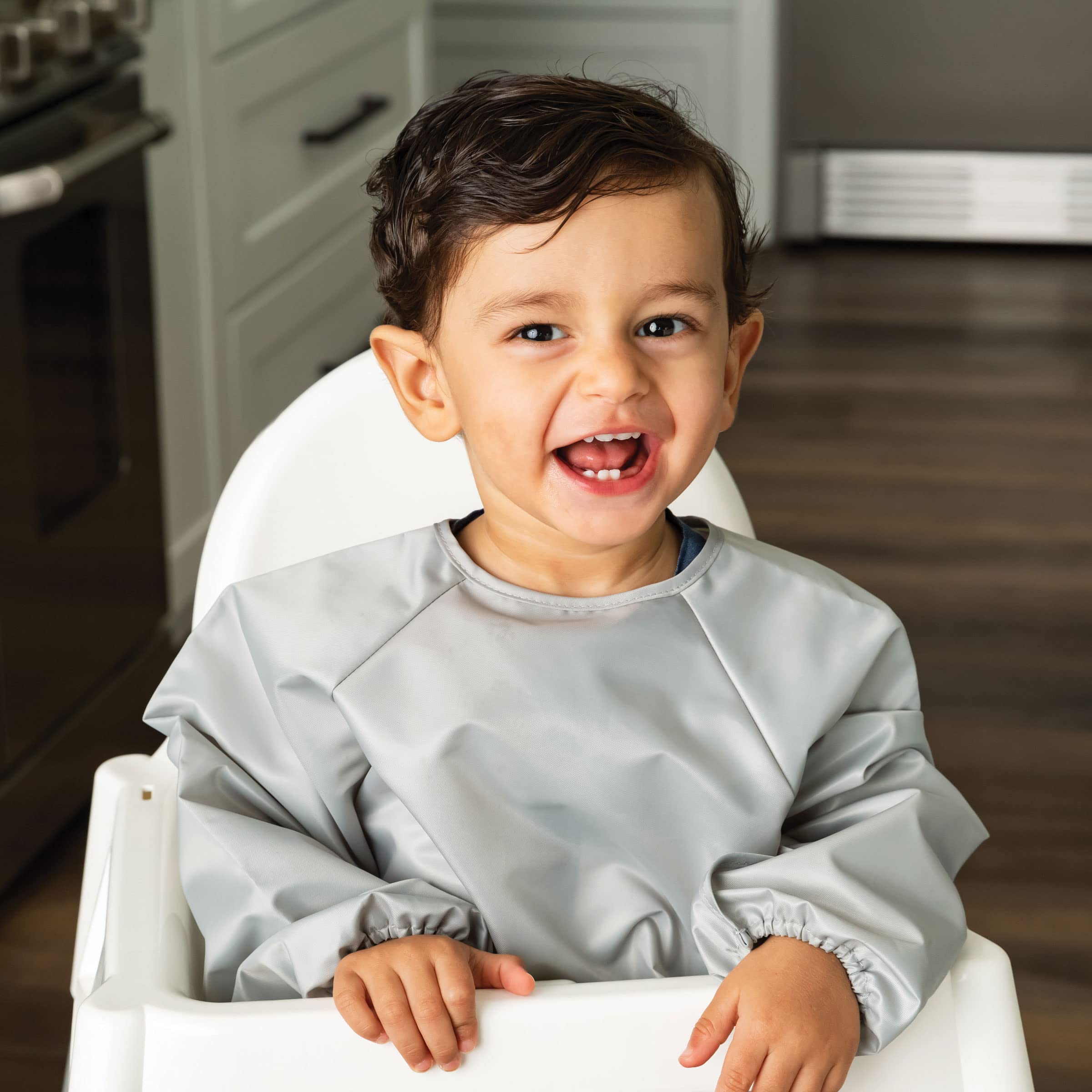 Tiny Twinkle long sleeve bib elastic-cuffs ensure comfortable unrestricted movement.