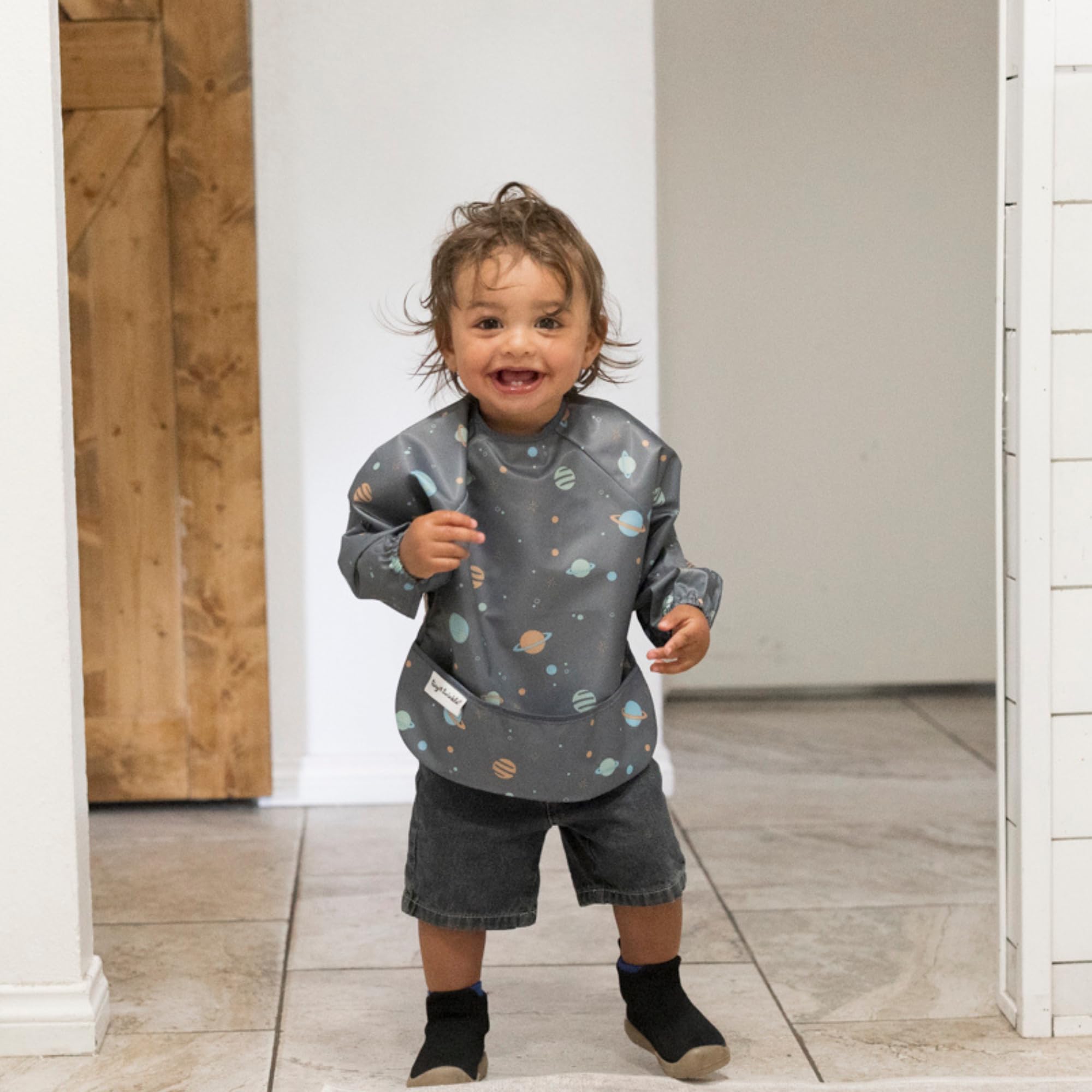 Tiny Twinkle long sleeve bib full-body coverage keeps outfits clean throughout messy meals
