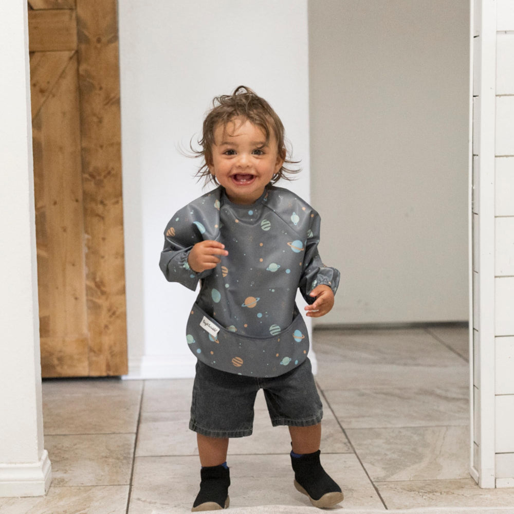Tiny Twinkle long sleeve bib full-body coverage keeps outfits clean throughout messy meals