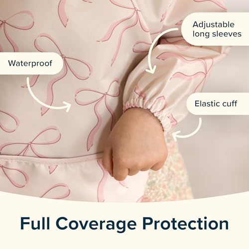 Tiny Twinkle long-sleeve bib in gift-ready packaging for newborn showers.