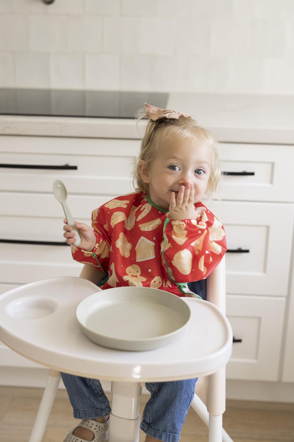 Tiny Twinkle long sleeve bib wiped clean after meals.
