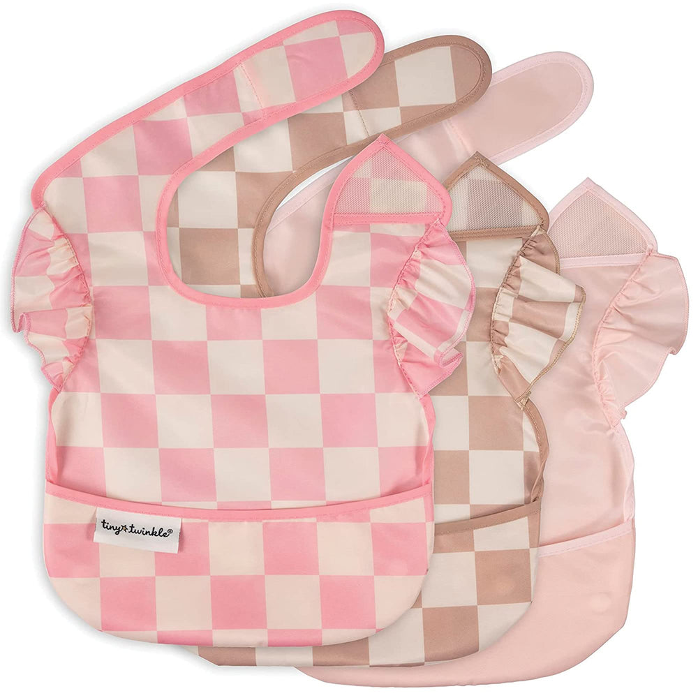 Tiny Twinkle mess-proof bib with checkers girl design front view keeps outfits clean.