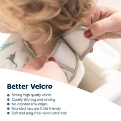 Tiny Twinkle mess-proof bib worn on a toddler demonstrates flexible comfort.